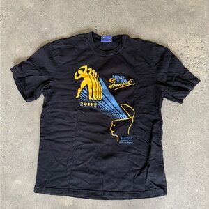 Black Graphic Tee with Yellow and Blue Design from Coney Island Picnic